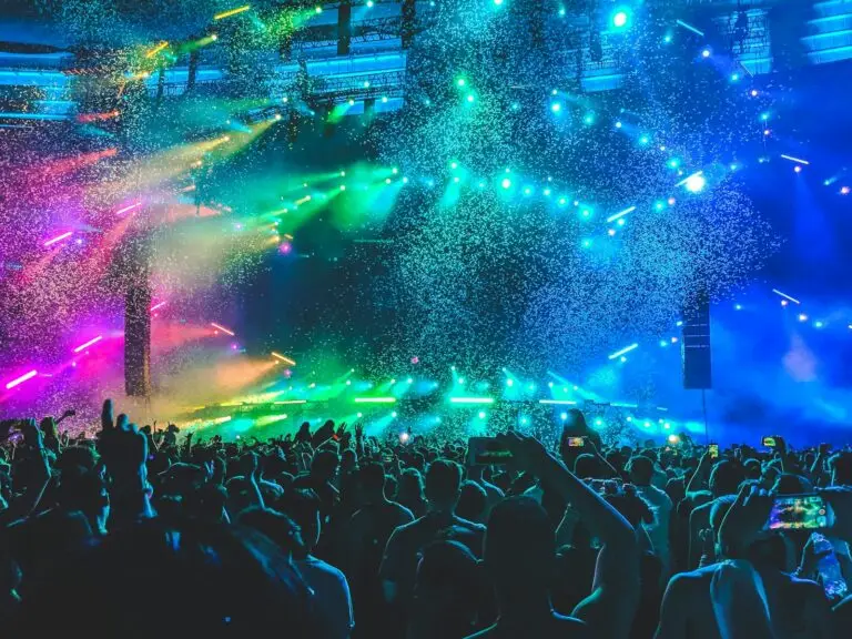 Excited audience watching a brightly lit live show